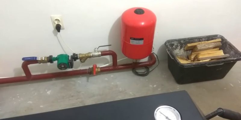 Как выполнить ремонт расширительного бака системы отопления?